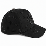 Total Black Edition cap side view with rhinestone starbursts